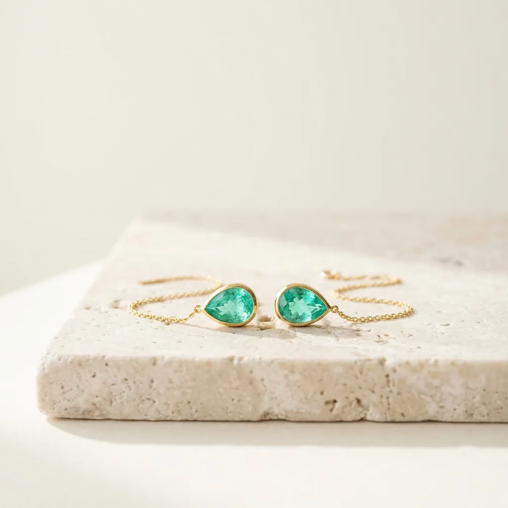 Pulsera de oro con dos piedras en gota verde agua