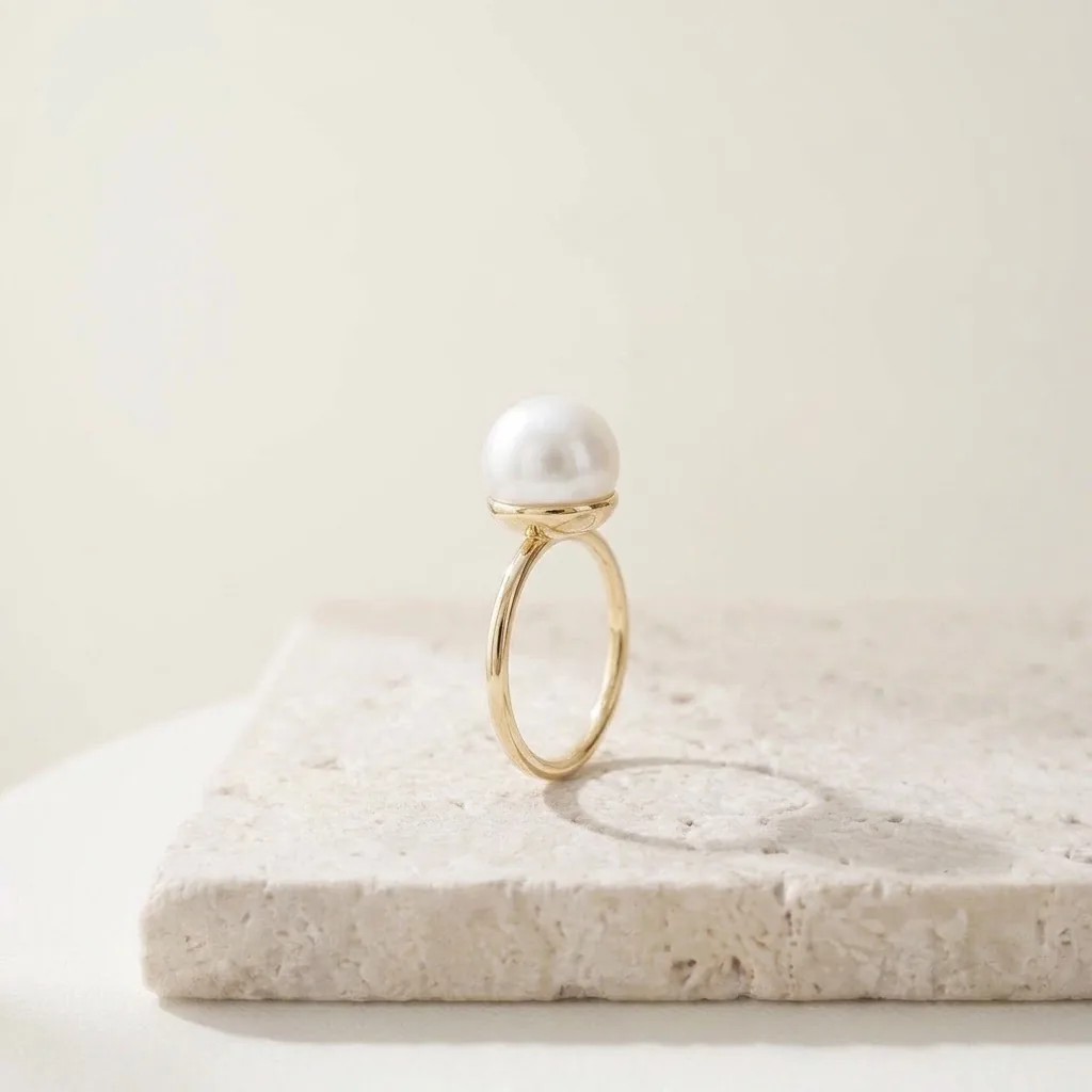 Anillo de oro con perla